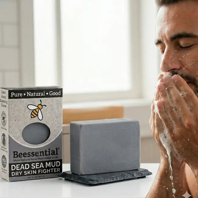 Man using Beessential Dead Sea Mud Soap to wash face with natural lather