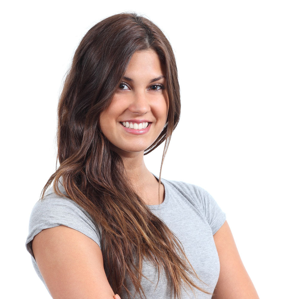 Woman with radiant shiny hair, example of hair nourished by sulfate-free shampoo