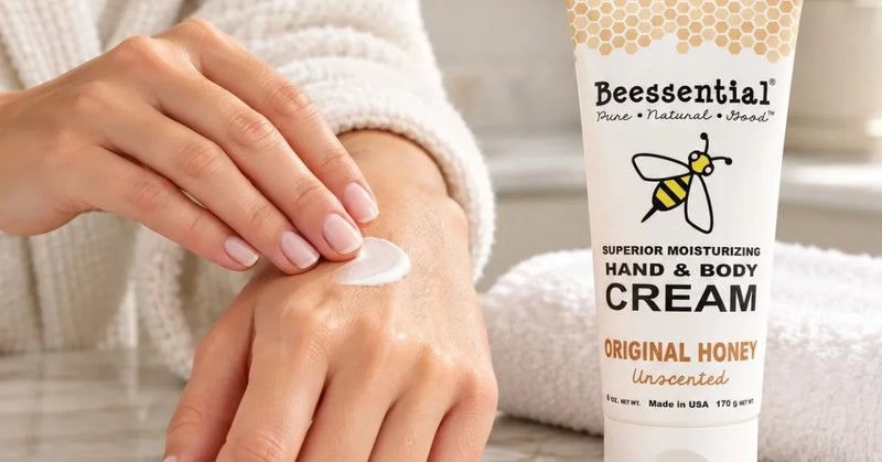 Applying Beessential honey hand cream to dry winter hands