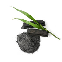 Close-up of detoxifying activated charcoal used in Beessential's natural body wash.