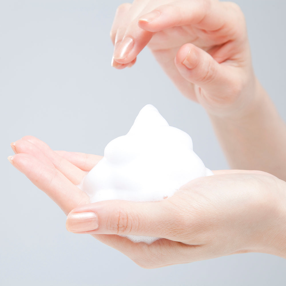 Beessential Peppermint Foaming Soap bottle in a bathroom setting. Refreshing and invigorating mint aroma.