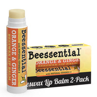 2-pack of Beessential Orange Ginger Lip Balm, perfect for travel or gifting.