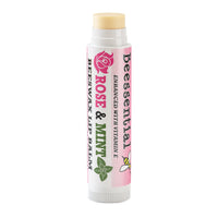 Open tube of Beessential Rose Mint Lip Balm. Smooth application with luxurious cupuacu butter for plump lips.